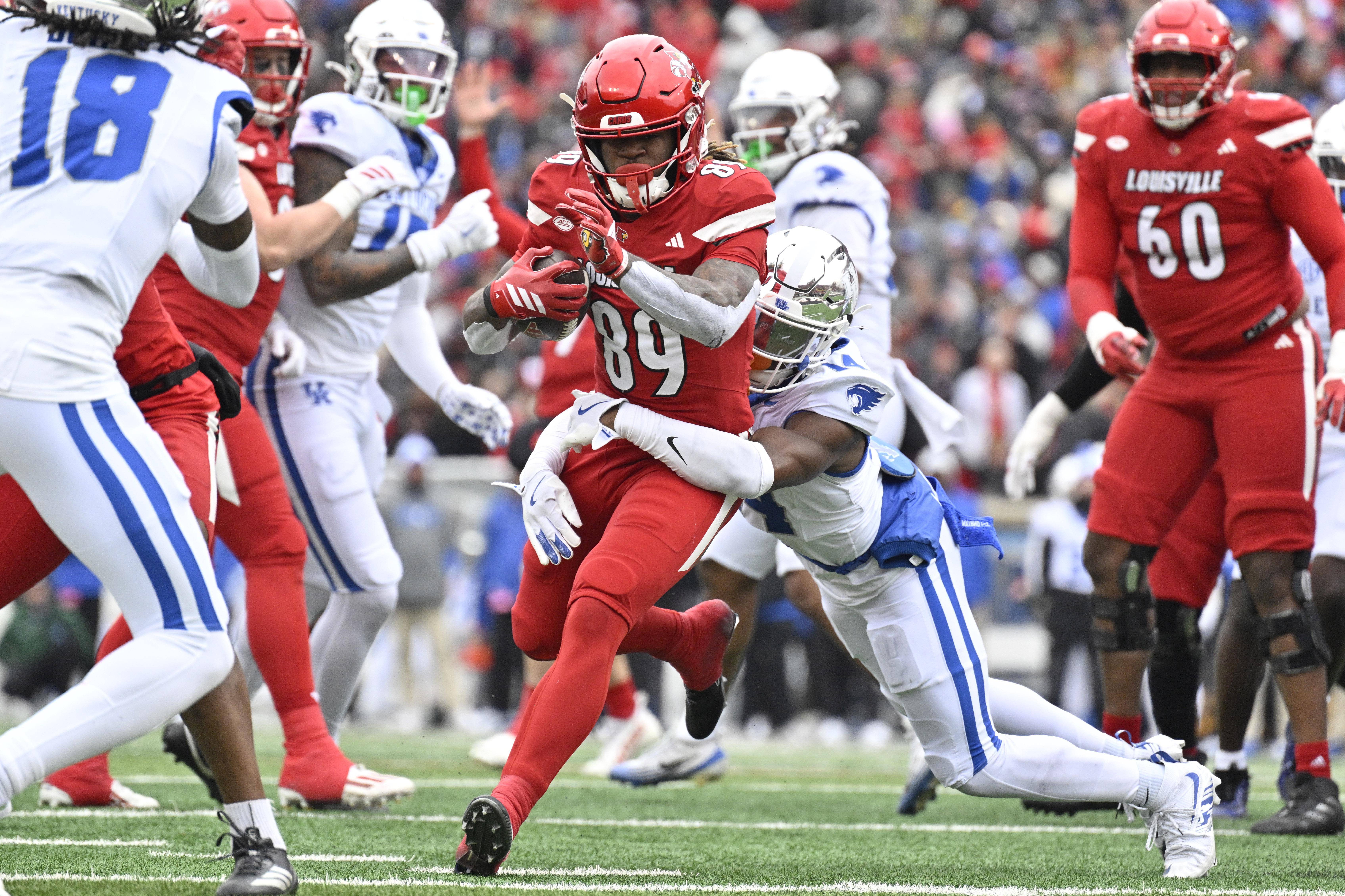 Louisville Cardinals — player action photograph