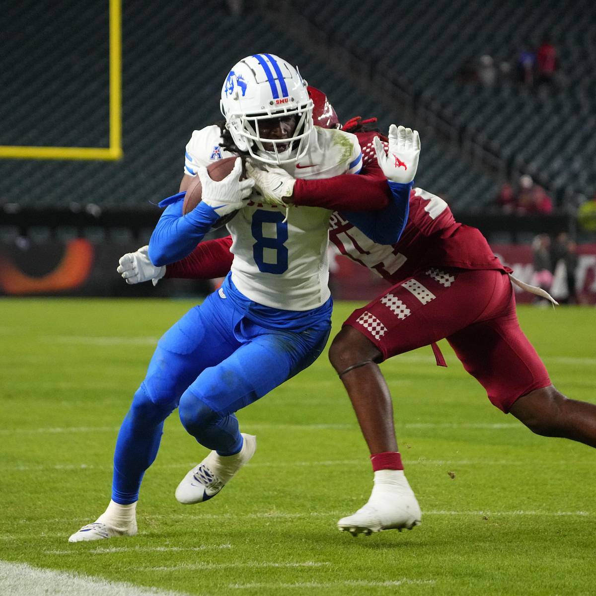 SMU Mustangs — player action photograph
