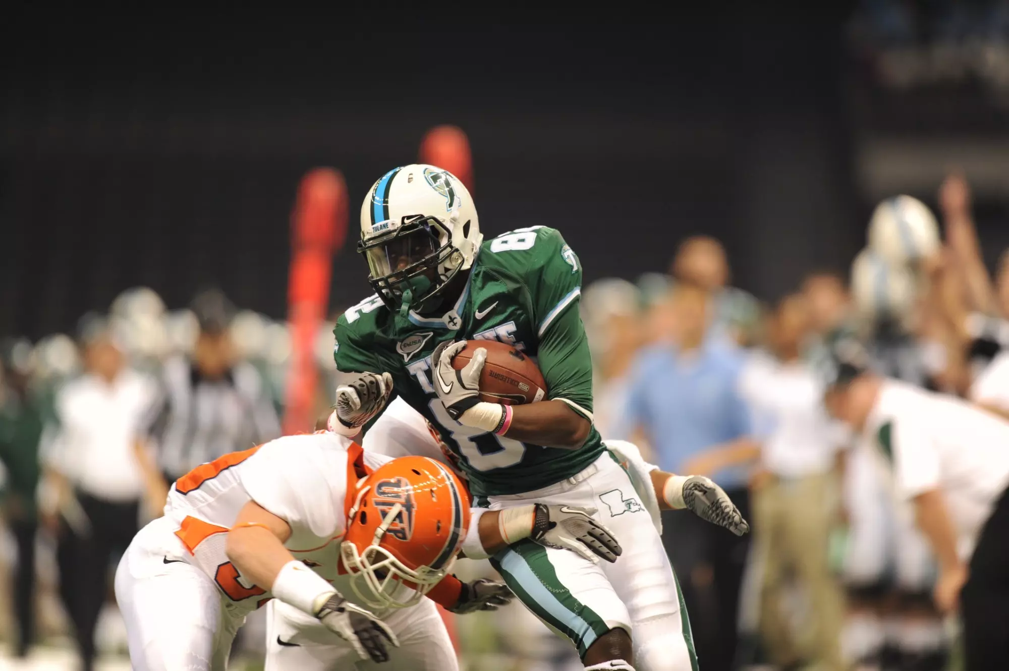 Tulane Green Wave — player action photograph