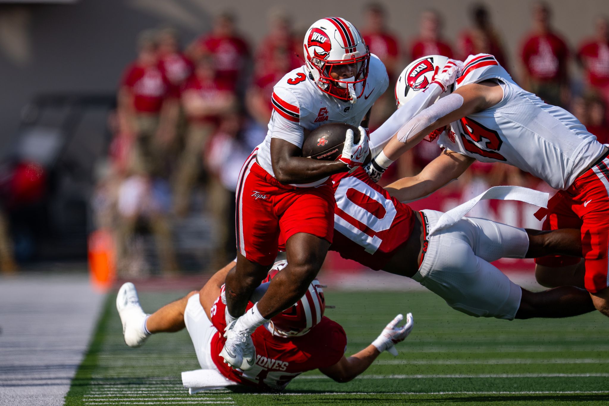 Western Kentucky Hilltoppers — player action photograph