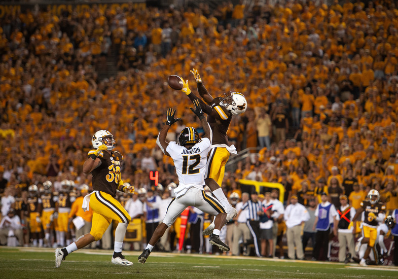Wyoming Cowboys — player action photograph
